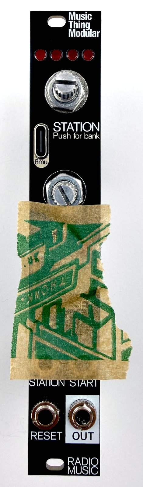 Radio Music panel with tape holding the button and SD card holder in place